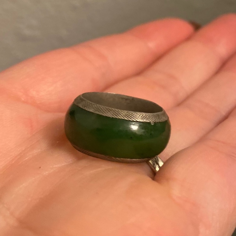 Green, vintage pinky ring with tribal carvings